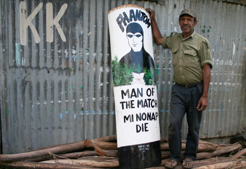 Illustration for article titled Why Does This Comic Book Hero Appear On So Many New Guinea War Shields?